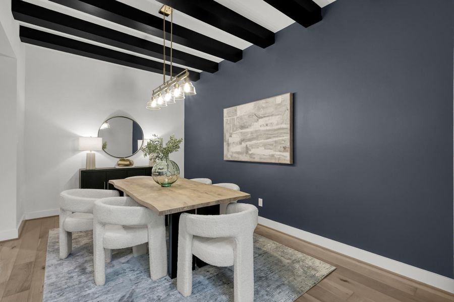 Alternate angle of the dining area highlighting the statement chandelier. Alternate angle of the dining area highlighting the statement chandelier.