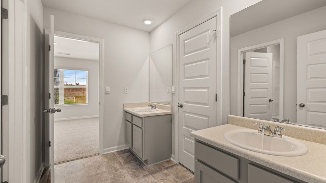 Representative furnished interior of a home built from the Grayson by D.R. Horton in Highland Hills, Graniteville (Image 12).