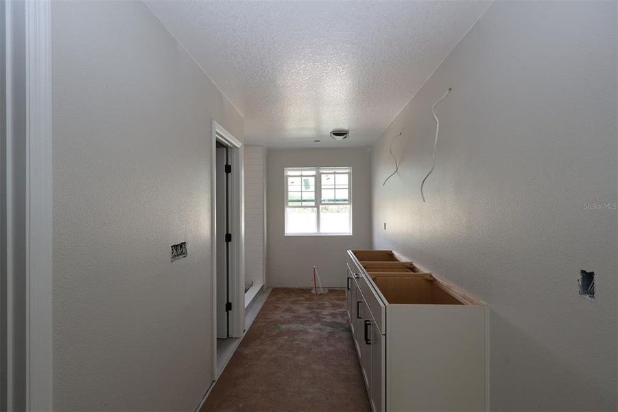 In-progress construction of a new home in Center Lake on the Park, St. Cloud, FL (Image 18).