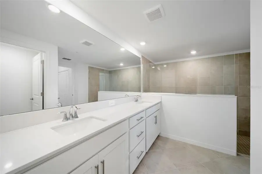 Furnished interior view inside a new home in Calusa Country Club, Lakewood Ranch (Image 15).
