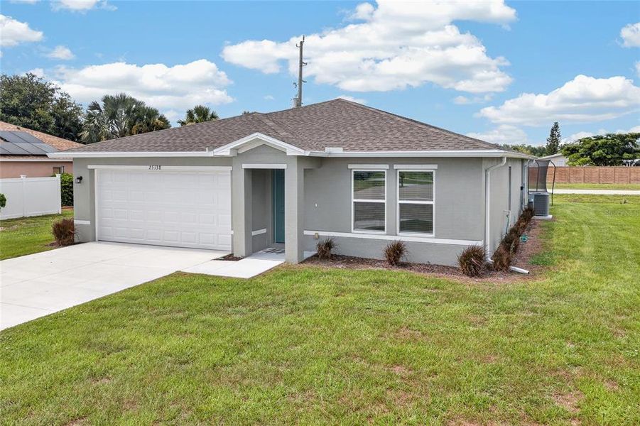 Front exterior of a new home in , Punta Gorda, FL, highlighting curb appeal (Image 27). Front exterior of a new home in , Punta Gorda, FL, highlighting curb appeal (Image 27).