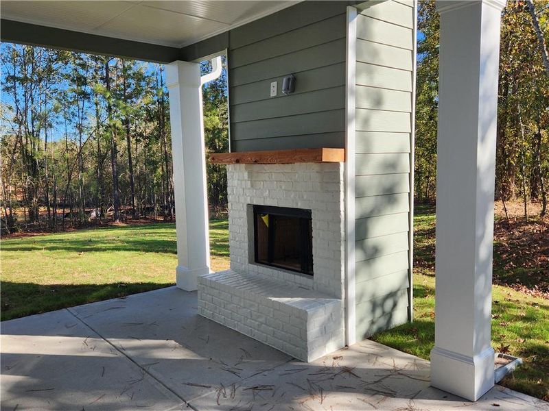 Exterior details and patio area of a home in The Woodlands Preserve, Jackson (Image 4).