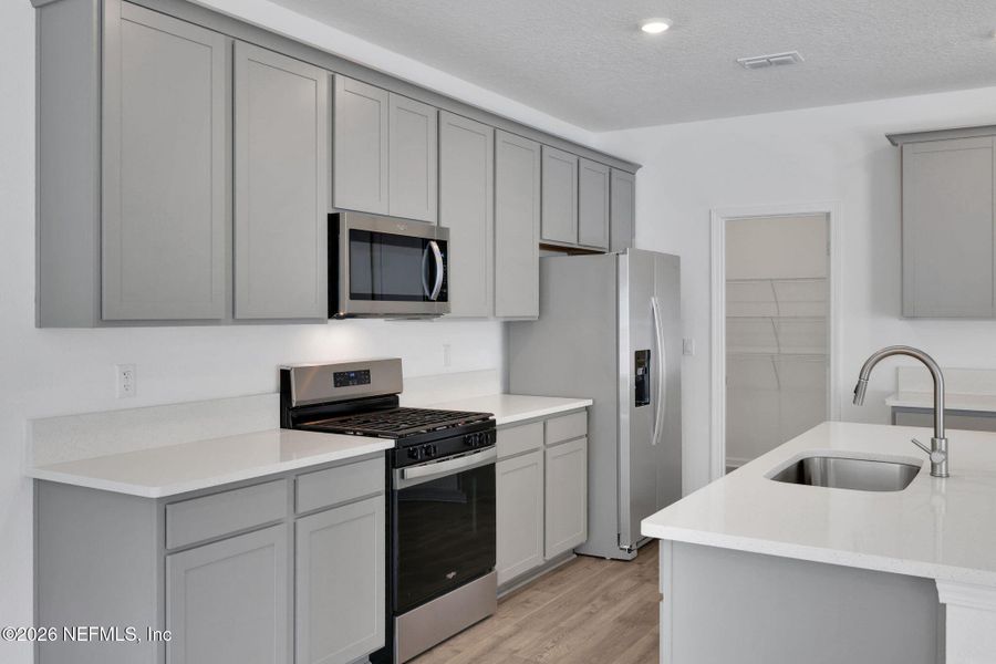 Furnished interior view inside a new home in Cedar Creek, Jacksonville (Image 9).