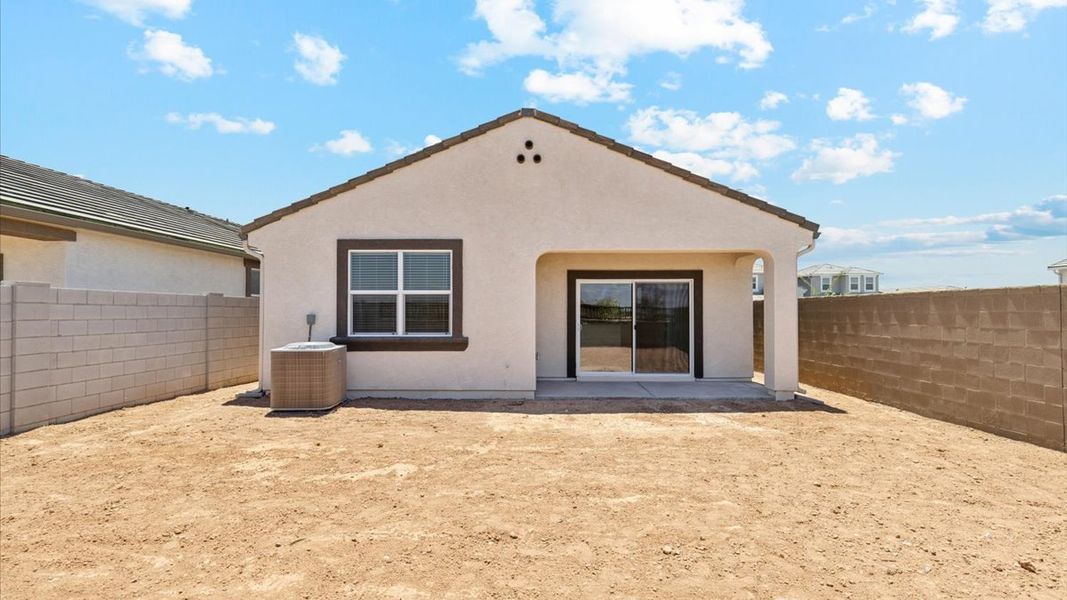 Exterior details and patio area of a home in Radiance at Superstition Vistas, Apache Junction (Image 21).