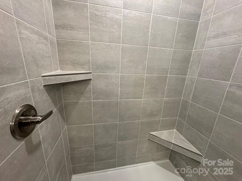 Primary Bath Shower with Tiled Wall, ledge, and seat