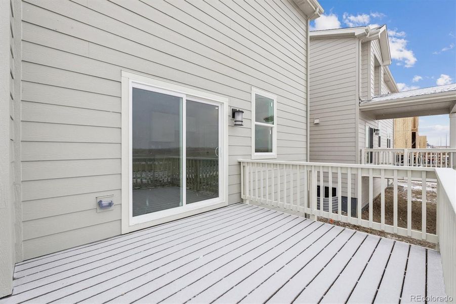 Exterior details and patio area of a home in Sweetgrass, Dacono (Image 3).