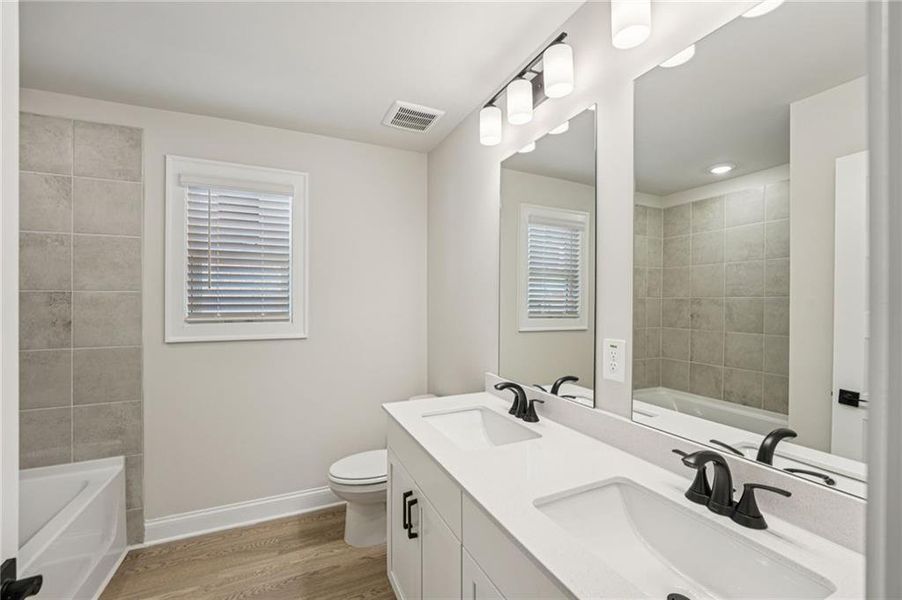 Furnished interior view inside a new home in Hemingway - Reserve Series, Cumming (Image 6). Furnished interior view inside a new home in Hemingway - Reserve Series, Cumming (Image 6).