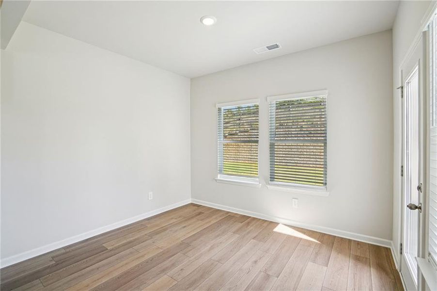 Spacious, unfurnished interior of a new home in Hawthorne Station, College Park (Image 32).
