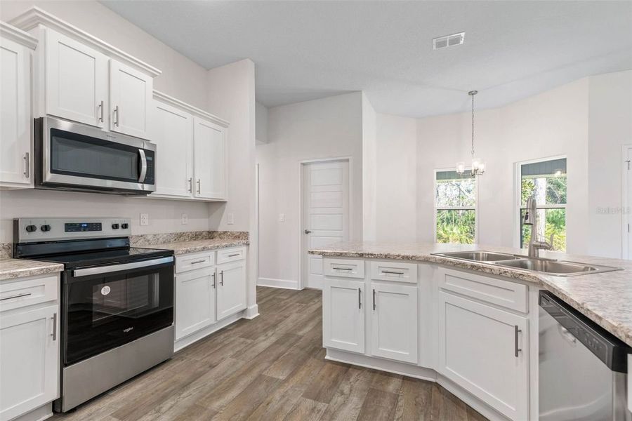 Representative furnished interior of a home built from the 2265 by Adams Homes in Veria, Oak Hill (Image 8).