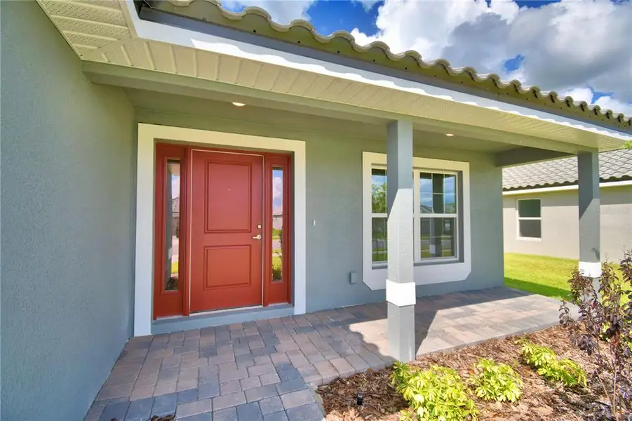 Exterior details and patio area of a home in , Auburndale (Image 3).