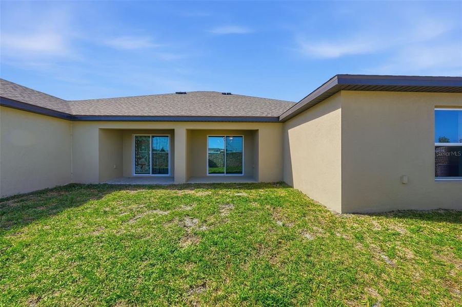 Exterior details and patio area of a home in Gum Lake Preserve, Lake Alfred (Image 23).