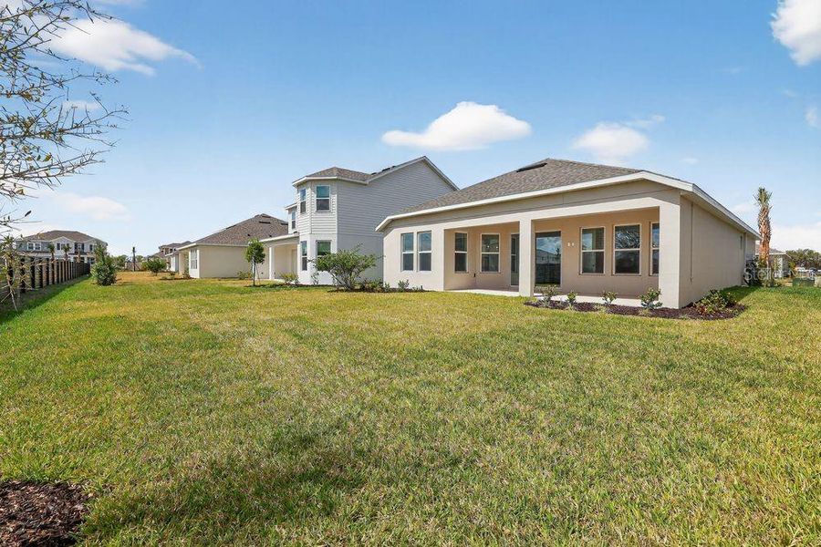 Exterior details and patio area of a home in Firethorn, Parrish (Image 23).