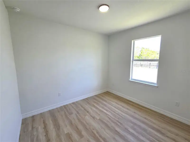 Spacious, unfurnished interior of a new home in , Port Charlotte (Image 12).