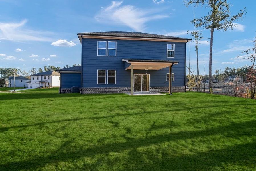 Exterior details and patio area of a home in Shadow Creek, Jackson (Image 3).