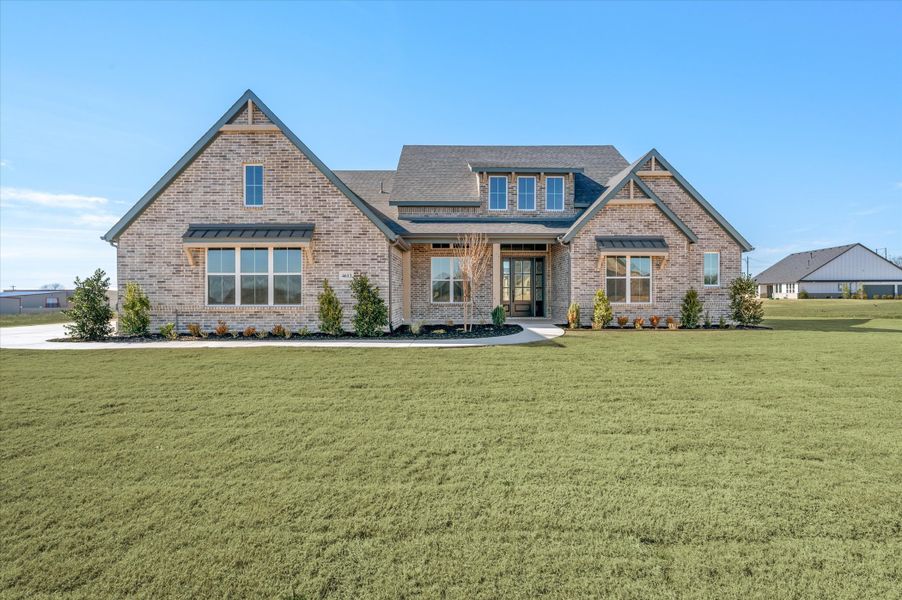 Representative exterior photo of a completed home built from the Cordova by Our Country Homes in NorthGlen, Haslet, TX (Image 4).