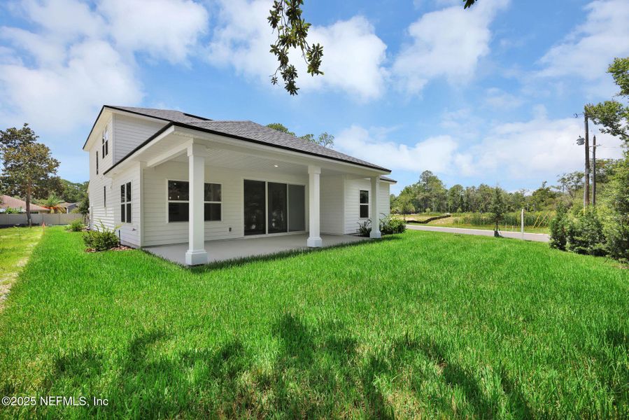 Exterior details and patio area of a home in Creighton Pointe, Fleming Island (Image 28).