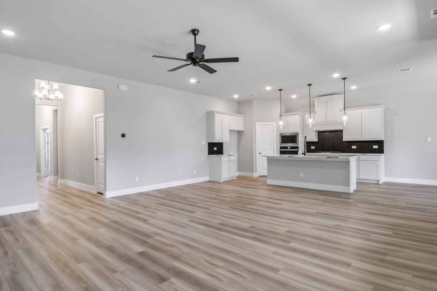 Representative furnished interior of a home built from the The Teton by Lillian Custom Homes in Polo Ridge, Heath (Image 15).