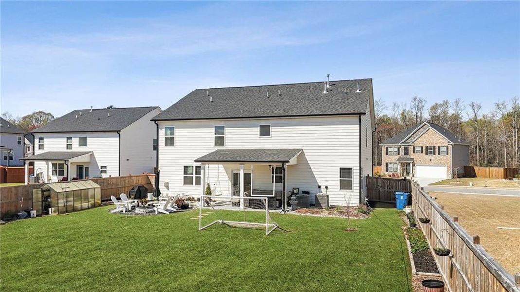 Exterior details and patio area of a home in Independence, Loganville (Image 34).