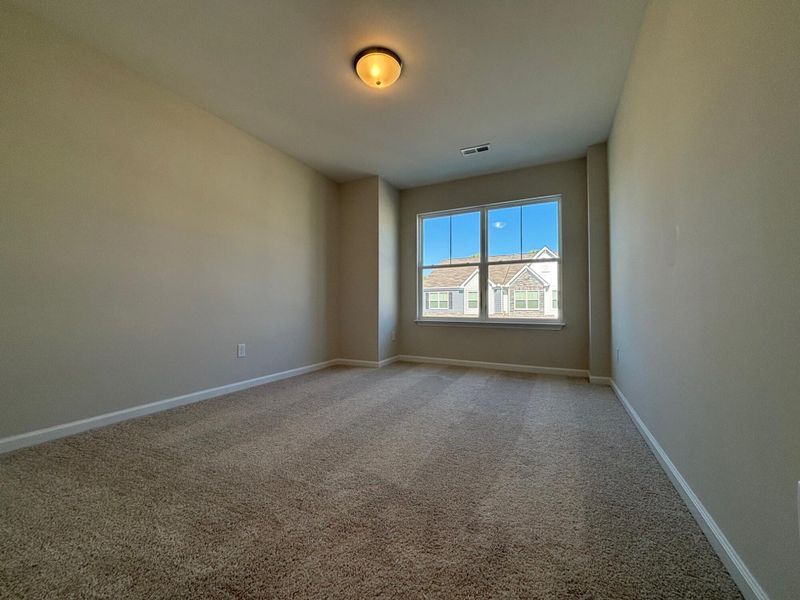 Spacious, unfurnished interior of a new home in Riverbrooke Townhomes, Simpsonville (Image 11).