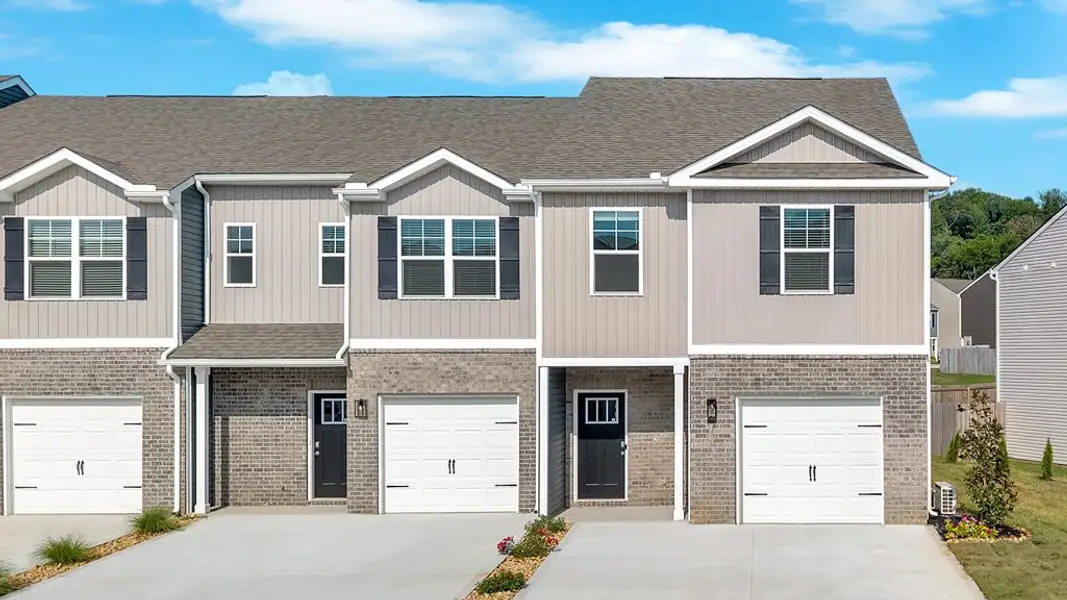 Front exterior of a new home in Fieldcrest Acres Townhomes, Blountville, TN, highlighting curb appeal (Image 1). Front exterior of a new home in Fieldcrest Acres Townhomes, Blountville, TN, highlighting curb appeal (Image 1).