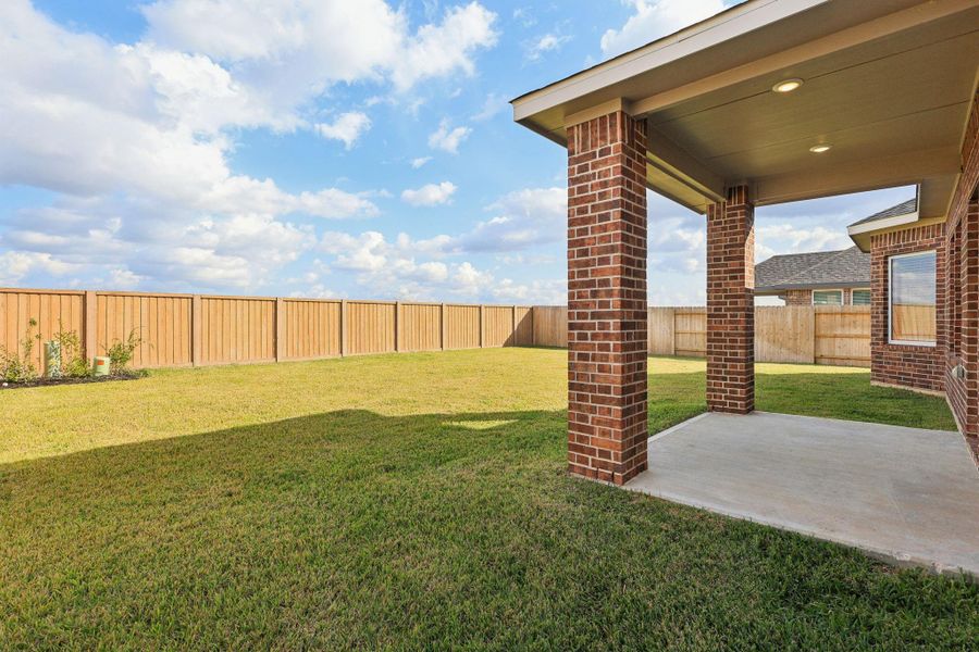 Exterior details and patio area of a home in Massey Oaks - Premier Series, Pearland (Image 3). Exterior details and patio area of a home in Massey Oaks - Premier Series, Pearland (Image 3).