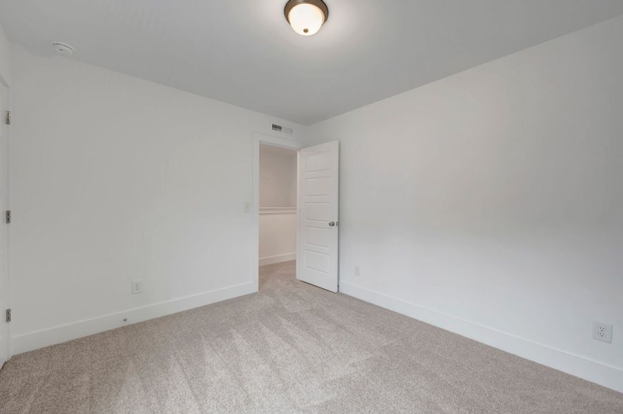 Spacious, unfurnished interior of a new home in Ashmore Townes, Garner (Image 28). Spacious, unfurnished interior of a new home in Ashmore Townes, Garner (Image 28).