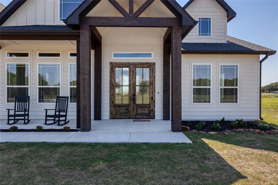 Front exterior of a new home in , Bowie, TX, highlighting curb appeal (Image 20).