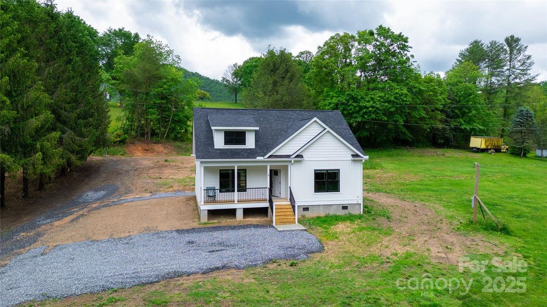 Front exterior of a new home in , Tuckasegee, NC, highlighting curb appeal (Image 15).