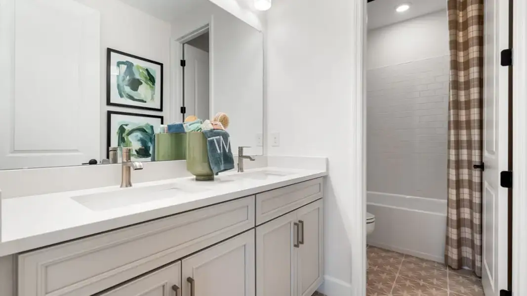 Representative furnished interior of a home built from the Monterey by Taylor Morrison in Azure at Solaeris, Port St. Lucie (Image 16).