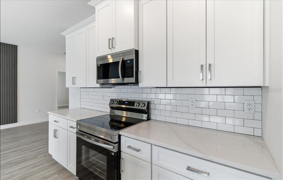 Furnished interior view inside a new home in , North Port (Image 19).
