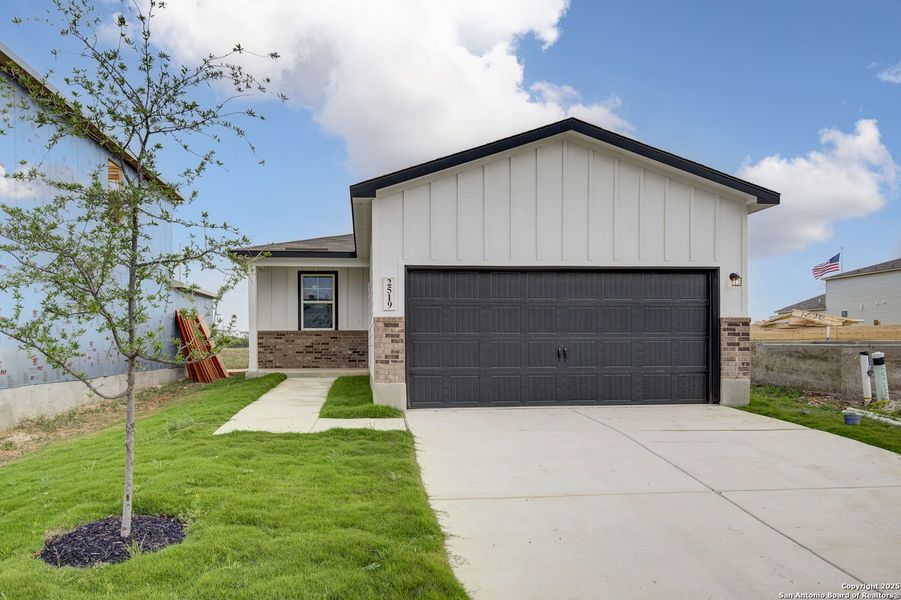 Front exterior of a new home in Applewhite Meadows, San Antonio, TX, highlighting curb appeal (Image 7).