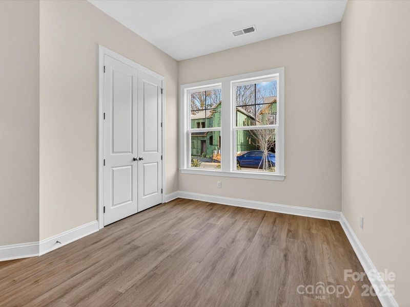 Spacious, unfurnished interior of a new home in North Creek Village, Huntersville (Image 27).