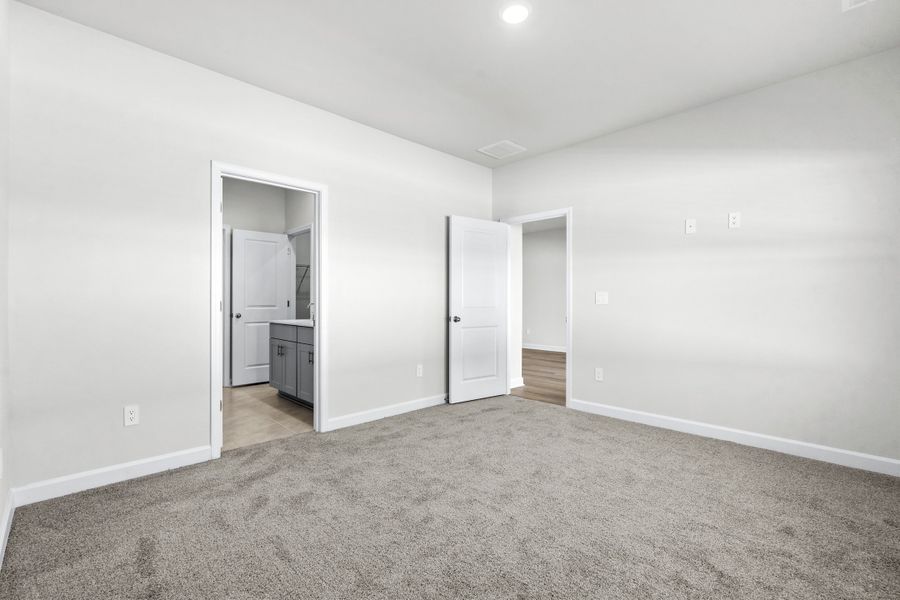 Spacious, unfurnished interior of a new home in Cypress Ridge - The Boardwalk Series, Longs (Image 18).