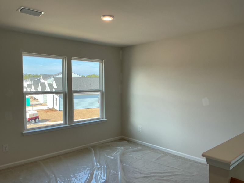 In-progress construction of a new home in Tea Farm: Presidents Series, Ravenel, SC (Image 31).