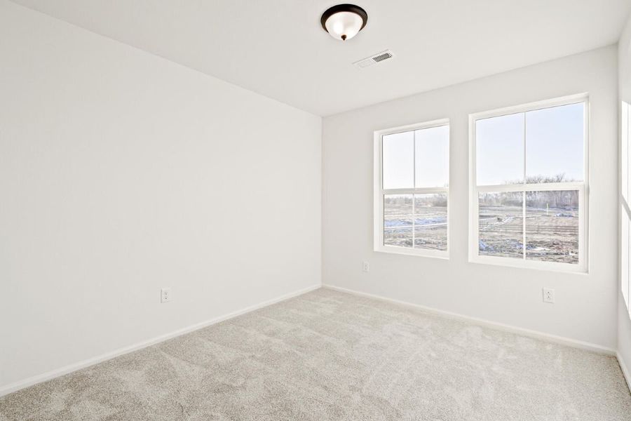 Spacious, unfurnished interior of a new home in The Nest Classic at Canyon Creek, Erie (Image 20).