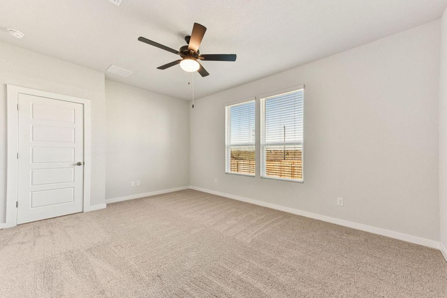 Spacious, unfurnished interior of a new home in Stallion Run, Buda (Image 21).