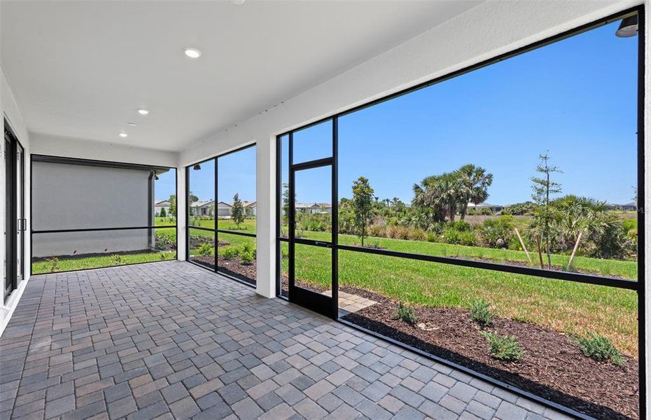 Exterior details and patio area of a home in Talon Preserve on Palmer Ranch, Nokomis (Image 20).