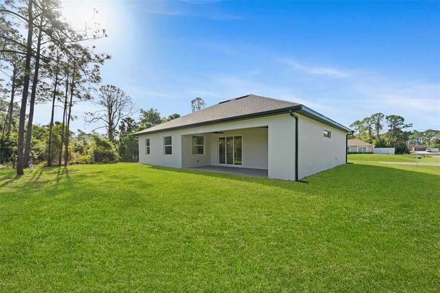 Exterior details and patio area of a home in , North Port (Image 27).