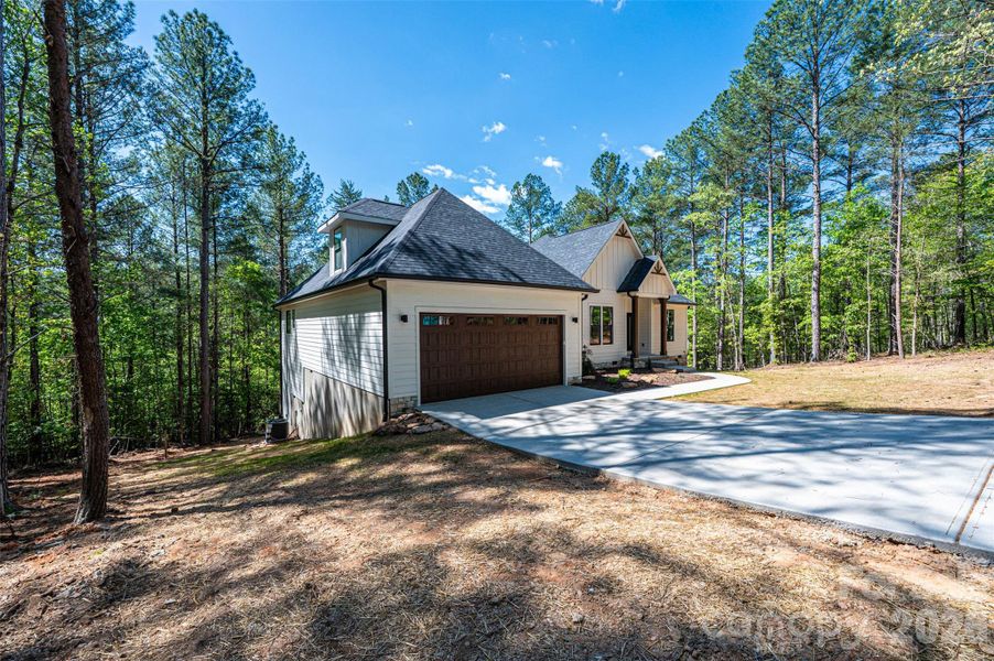 Front exterior of a new home in , Connelly Springs, NC, highlighting curb appeal (Image 21). Front exterior of a new home in , Connelly Springs, NC, highlighting curb appeal (Image 21).