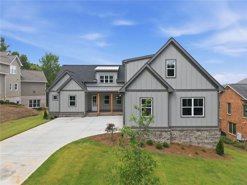 Front exterior of a new home in , Jefferson, GA, highlighting curb appeal (Image 28).