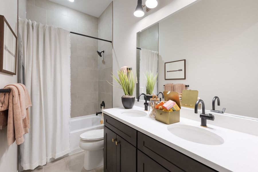 Representative furnished interior of a home built from the 5002 by Risewell Homes in The Estates Collection at Murphy Creek, Aurora (Image 23).