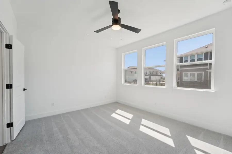 Spacious, unfurnished interior of a new home in Avery Centre, Round Rock (Image 11).