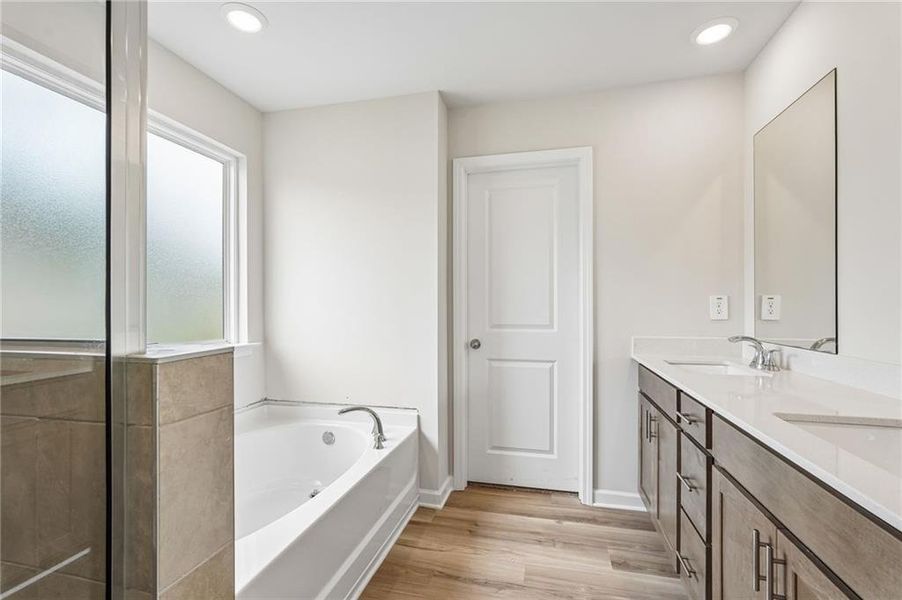 Furnished interior view inside a new home in Northwoods at Mirror Lake, Villa Rica (Image 9).