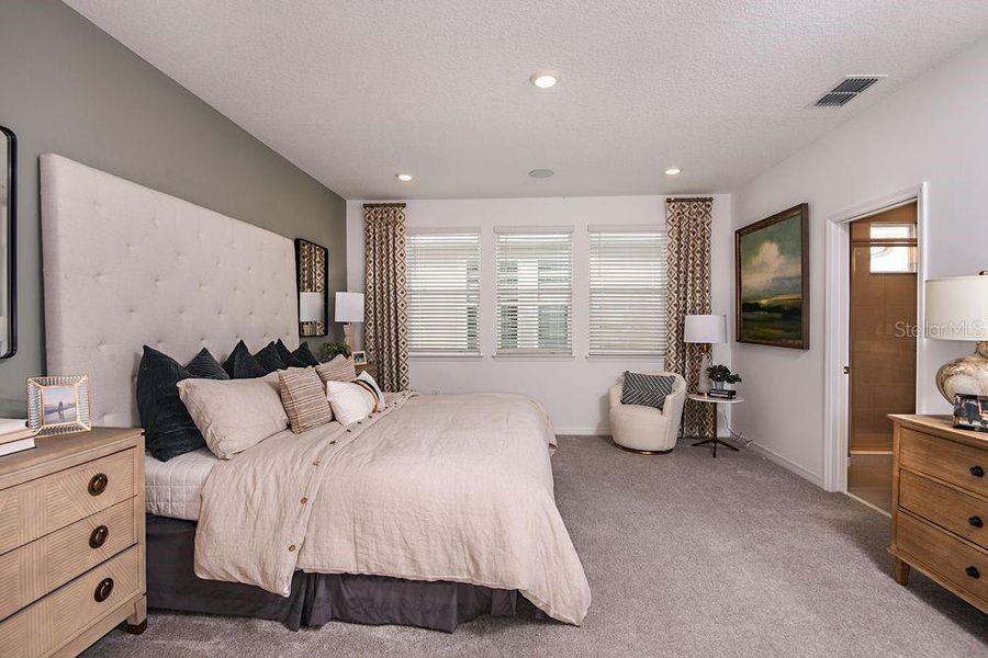 Furnished interior view inside a new home in Harvest at Ovation, Winter Garden (Image 16).