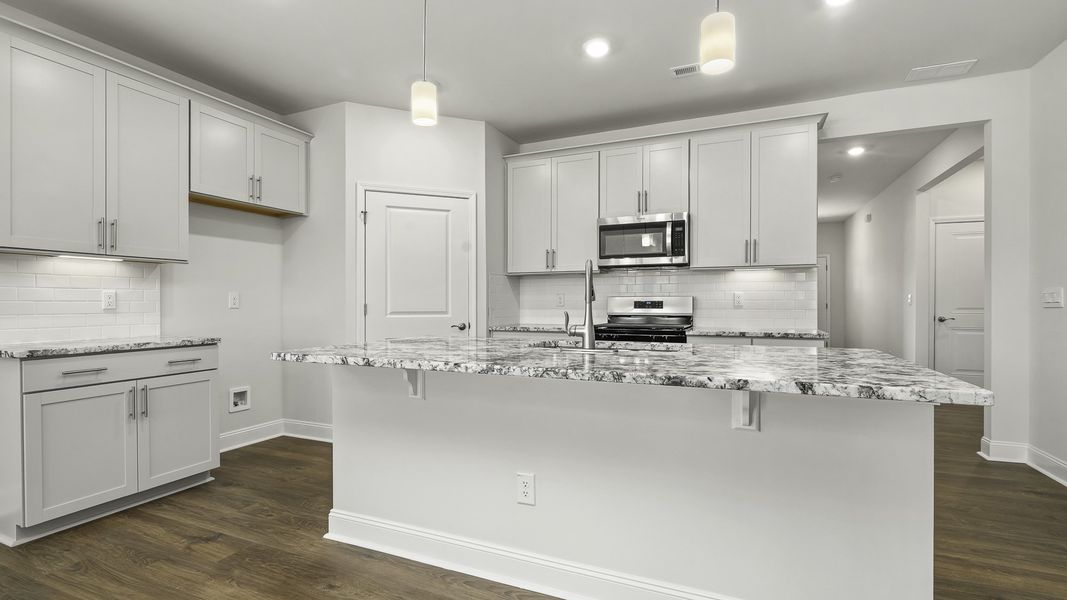 Furnished interior view inside a new home in The Villas at Kinsley, Jamestown (Image 5).