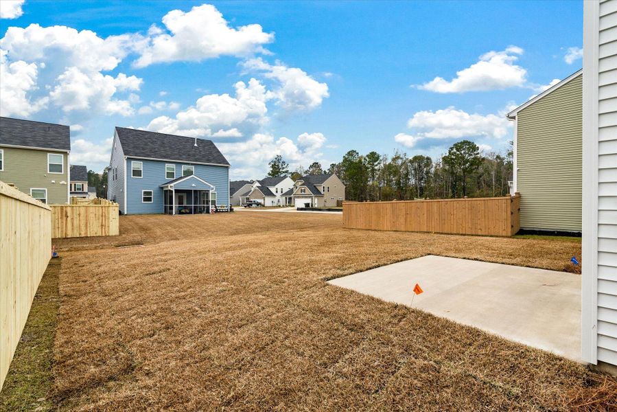 Exterior details and patio area of a home in Oakley Pointe, Moncks Corner (Image 23). Exterior details and patio area of a home in Oakley Pointe, Moncks Corner (Image 23).