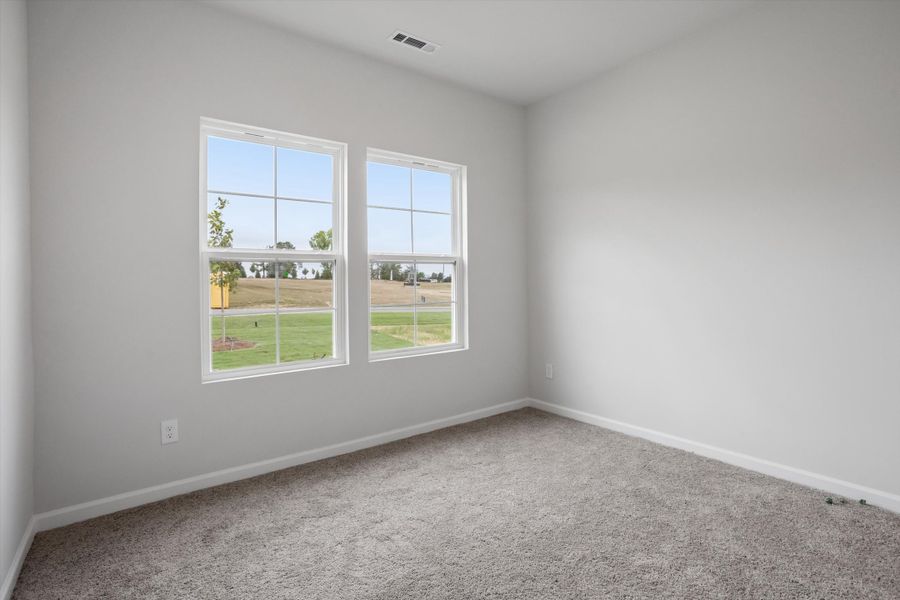 Spacious, unfurnished interior of a new home in Cambridge Reserve, Angier (Image 26).
