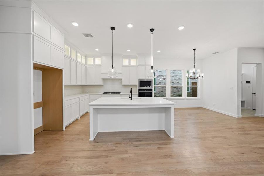 Furnished interior view inside a new home in Light Farms Brenham - 40' Lots, Celina (Image 9). Furnished interior view inside a new home in Light Farms Brenham - 40' Lots, Celina (Image 9).