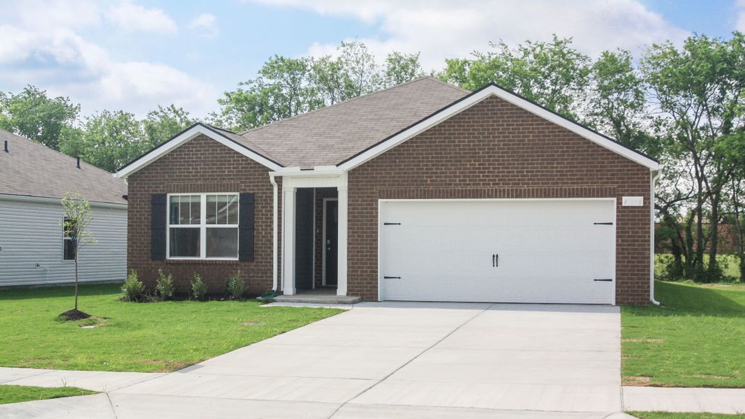 Front exterior of a new home in The Parks, White House, TN, highlighting curb appeal (Image 1).