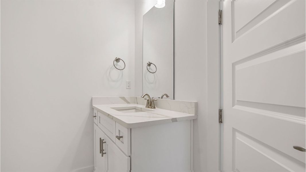 Representative furnished interior of a home built from the Magnolia by D.R. Horton in Breakfast Point East Phase II, Panama City Beach (Image 14).